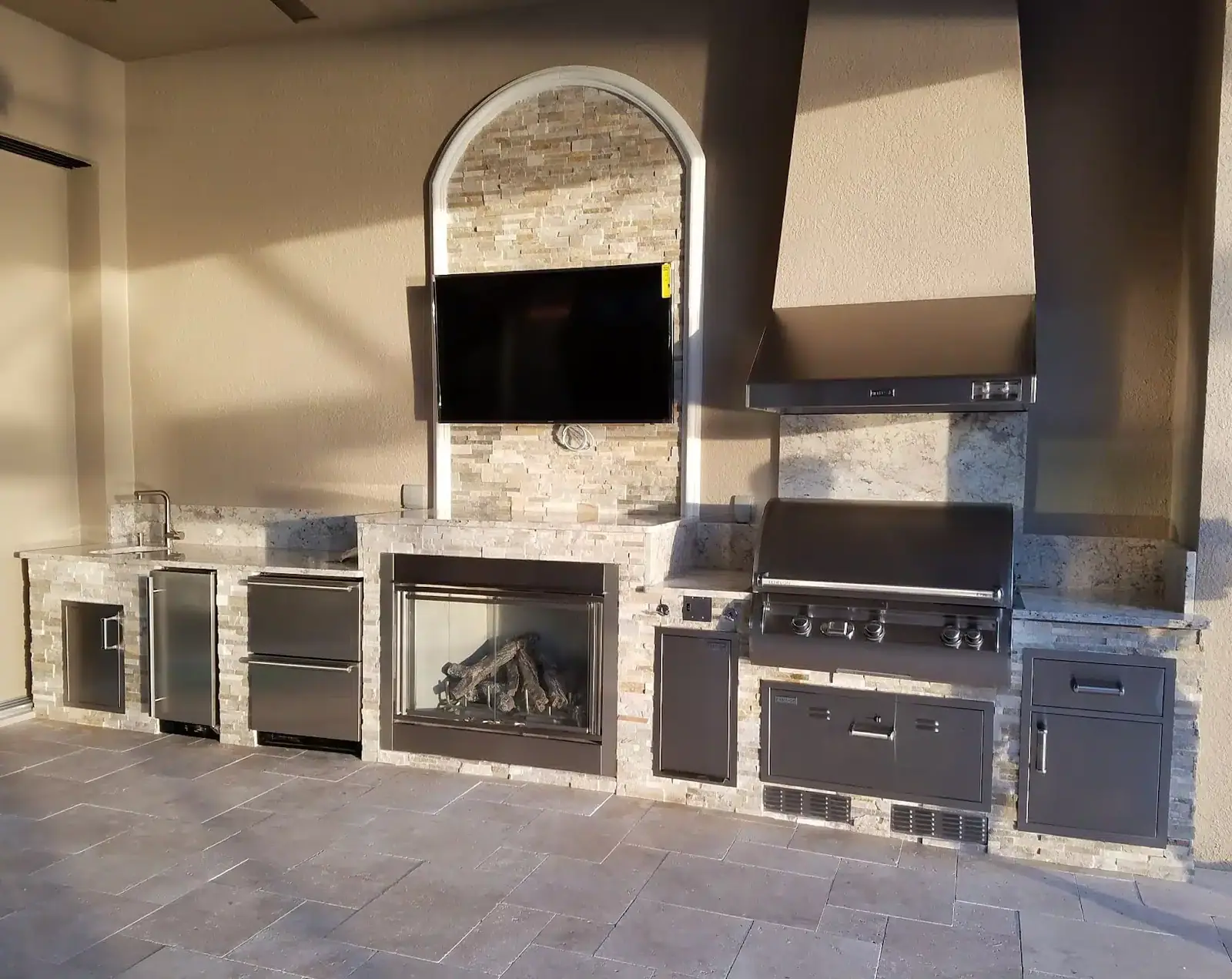 Custom outdoor gas fireplace or fire pit built in Southwest Florida