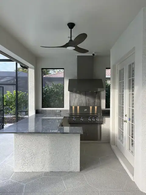 An L shaped Outdoor kitchen with exotic granite built in Naples, FL. An L shaped Outdoor kitchen with exotic granite built in Naples, FL.