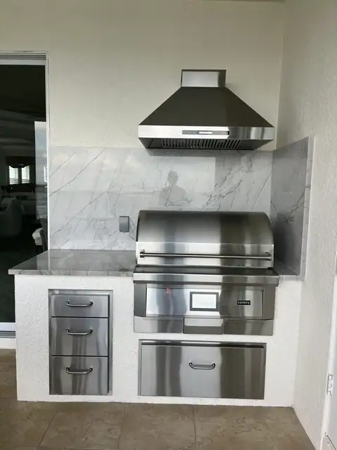 An outdoor kitchen with electric pellet grill installed in Punta Gorda, FL. An outdoor kitchen with electric pellet grill installed in Punta Gorda, FL.