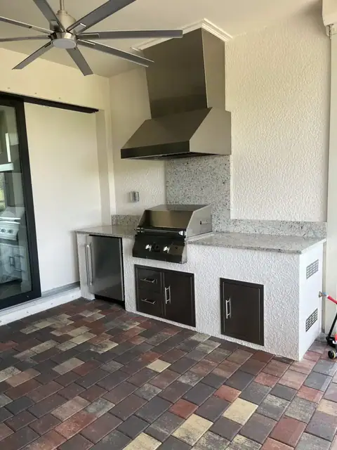 A custom outdoor kitchen with stainless steel chase and trim built in Ft Myers, FL. A custom outdoor kitchen with stainless steel chase and trim built in Ft Myers, FL.